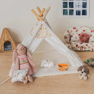 Dollhouse living room furniture scene with bunny and mouse figures, indoor tent, sofa and cozy accessories in a 1:12 miniature home.