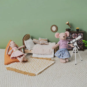 Soft imaginative play with Milo and Pip dolls in a calm, cozy bedtime setting.
