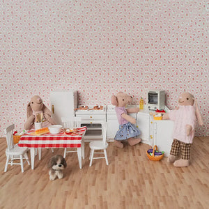 Detailed dollhouse kitchen interior with cabinets, oven and cooking area as mouse and bunny figures prepare food together