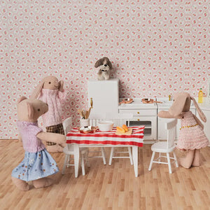 Warm home scene with mouse, bunny and bunny mom around a kitchen table in a soft and cozy miniature environment