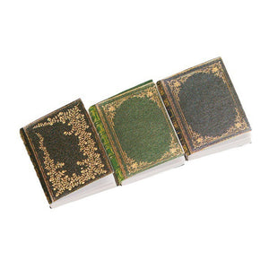 Dollhouse spell book set with three ornate vintage paper books and flippable pages for magical miniature scenes