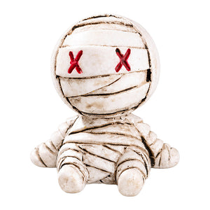 Dollhouse Halloween decorations with a tiny wrapped mummy figurine, perfect for a charming spooky room or porch.