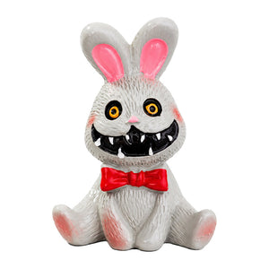 Dollhouse Halloween decorations featuring a creepy bunny figurine with storybook charm for a whimsical spooky room.