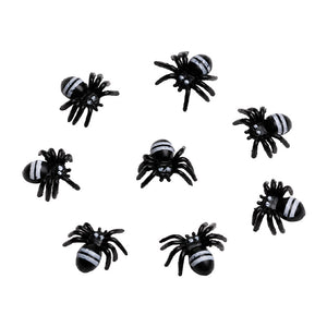 Dollhouse Halloween decorations with tiny black spider figurines for floors, garden paths, and spooky room scenes.