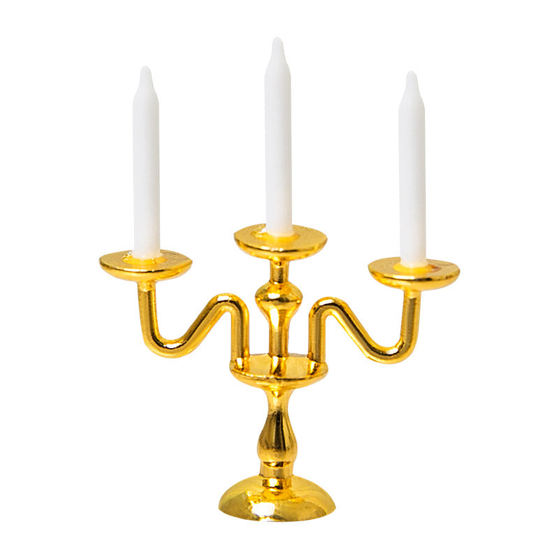 White background product image of a resin candle with metal mini candle holder for a 1:12 scale dollhouse scene