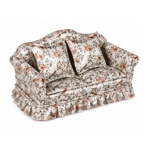Satin dollhouse sofa with vintage floral upholstery, two cushions and ruffled trim for a cozy miniature living room