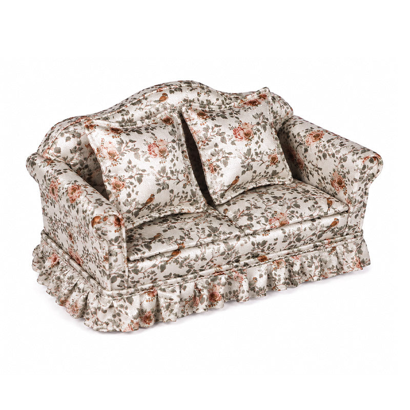 Satin dollhouse sofa with vintage floral upholstery, two cushions and ruffled trim for a cozy miniature living room