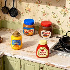 Colorful dollhouse kitchen Miniature Condiments jars styled on a countertop, playful pantry decor with everyday cozy realism