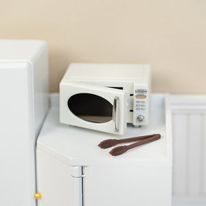 Openable dollhouse microwave with tiny tongs and realistic door, playful kitchen accessory for cozy meal prep and snack scenes