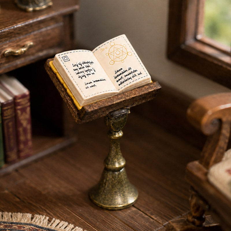 Miniature reading stand with open book styled by a window for a warm vintage library or study scene