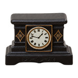 Dollhouse mantel clock in black resin with gold accents and Roman numerals for warm vintage miniature decor.