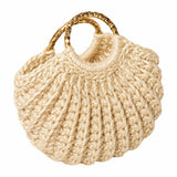 Beige dollhouse handbag with soft crochet texture and gold handles, perfect for warm neutral miniature styling