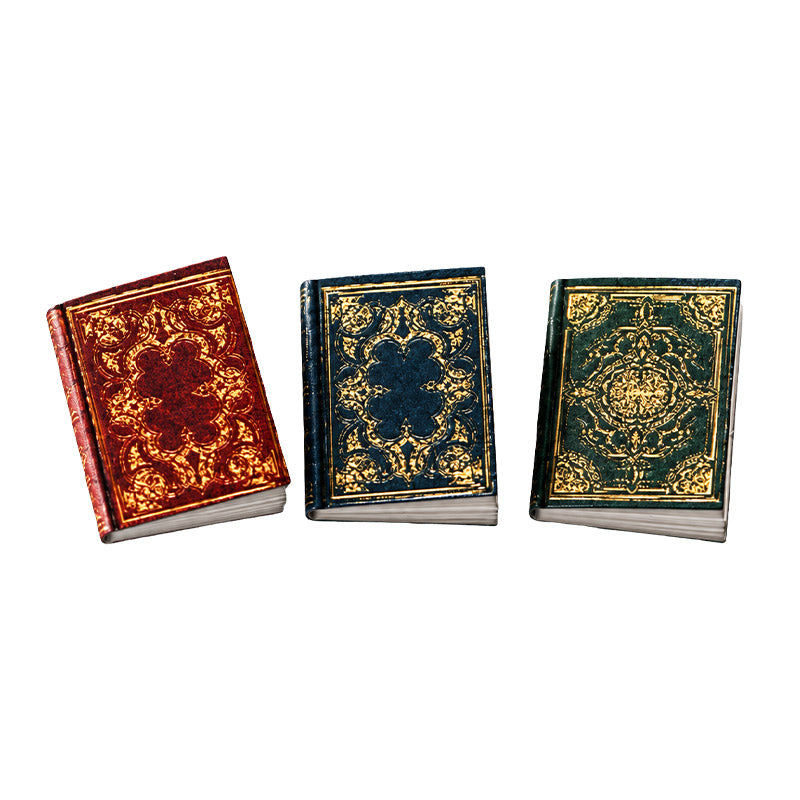 Dollhouse spell book set with three ornate vintage paper books and flippable pages for magical miniature scenes