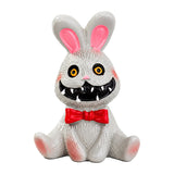 Dollhouse Halloween decorations featuring a creepy bunny figurine with storybook charm for a whimsical spooky room.