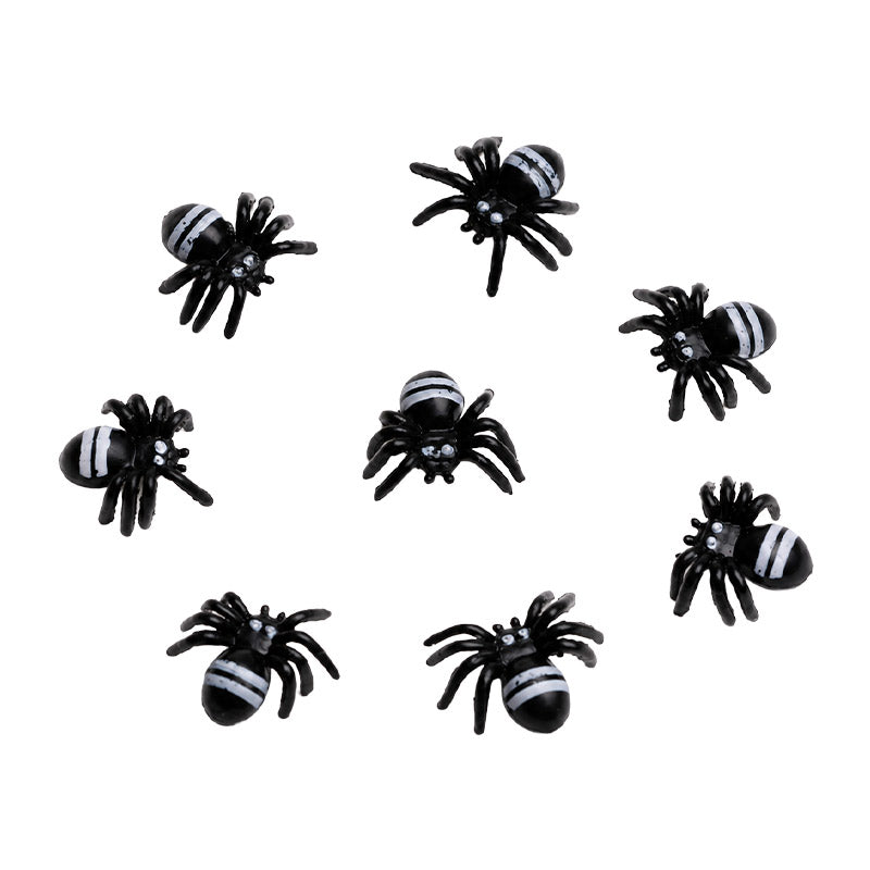 Dollhouse Halloween decorations with tiny black spider figurines for floors, garden paths, and spooky room scenes.