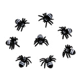 Dollhouse Halloween decorations with tiny black spider figurines for floors, garden paths, and spooky room scenes.