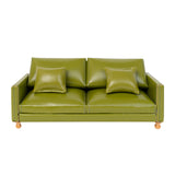 Dollhouse Leather Sofa in olive green PU with two matching cushions, bringing cozy vintage charm to a 1:12 living room
