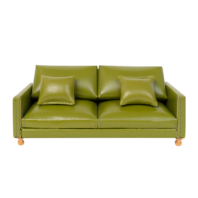 Dollhouse Leather Sofa in olive green PU with two matching cushions, bringing cozy vintage charm to a 1:12 living room