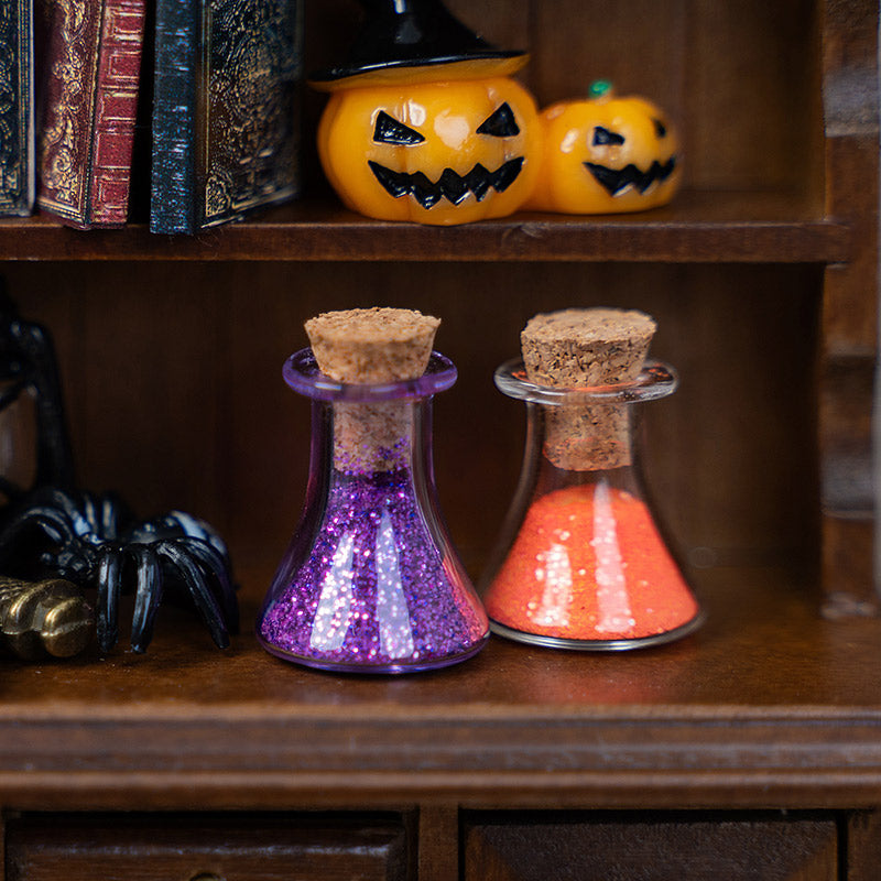 Purple and orange glitter potions with cork stoppers, styled on a wooden alchemy shelf for a magical Halloween scene