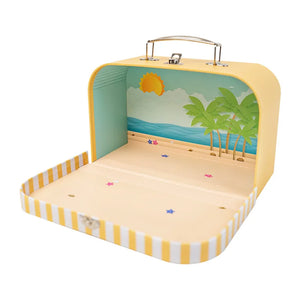 Portable dollhouse suitcase with beach-inspired interior, adding playful 1:12 scale scenery to tiny story worlds