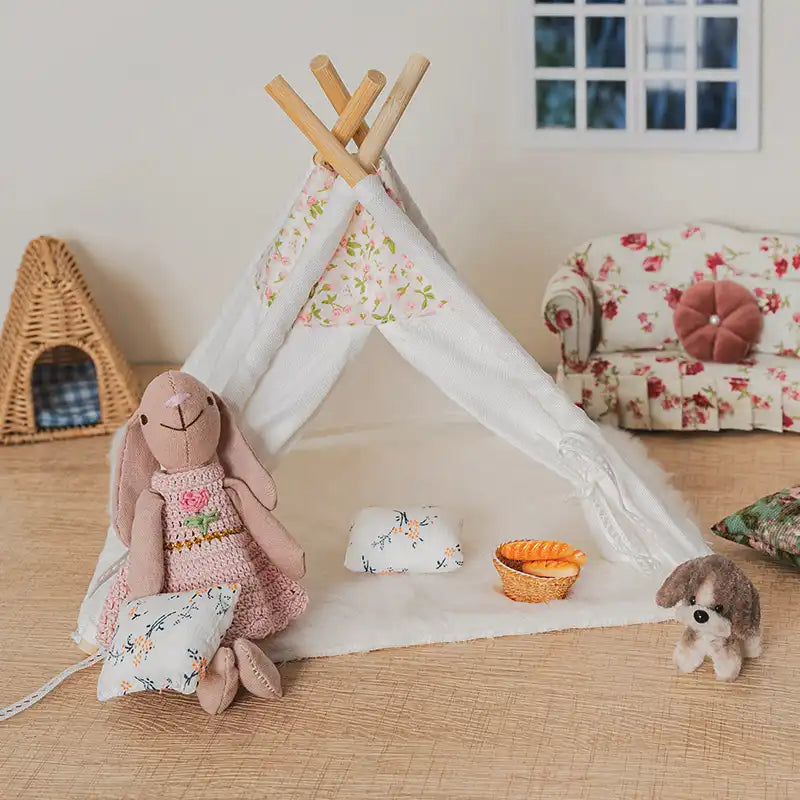 Dollhouse living room furniture scene with bunny and mouse figures, indoor tent, sofa and cozy accessories in a 1:12 miniature home.