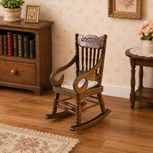 Vintage miniature rocking chair paired with a bookcase and side table in a warm classic living room corner