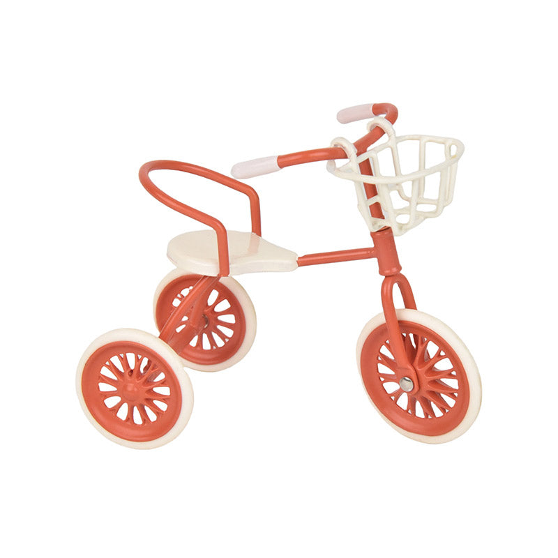 Red dollhouse tricycle with basket, a bright miniature accessory for garden scenes, picnics and little adventures