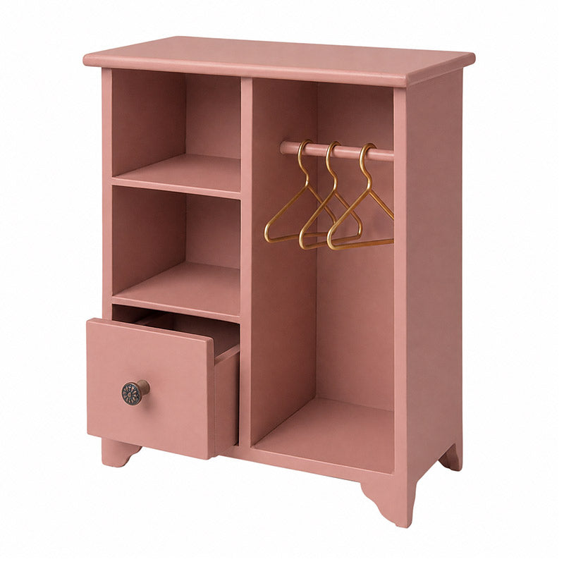 Dusty rose dollhouse wardrobe with three gold hangers and storage shelves for a charming 1:12 dressing room