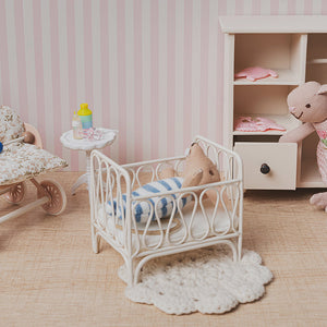 Miniature nursery scene with Handmade Mouse Baby in crib, 1:12 scale dollhouse setup with cozy bedding and furniture.