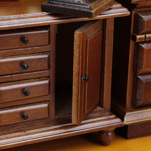 Miniature wooden storage cabinet with an open side door, adding functional detail to a classic room scene