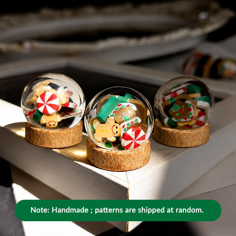 Handmade Christmas globe ornaments with assorted candy patterns, perfect for styling a festive miniature shelf or mantel
