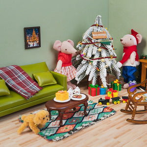 Festive dollhouse living room rug styled with a sofa, coffee table, and Christmas tree for a warm family holiday scene.