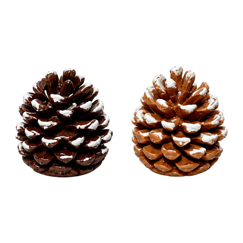 Dollhouse Pinecones in rich brown and snow-dusted finishes, adding rustic winter charm to a cozy miniature home.