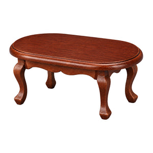 Handmade Dollhouse Coffee Table in reddish brown wood with curved legs, adding vintage charm to a cozy 1:12 living room