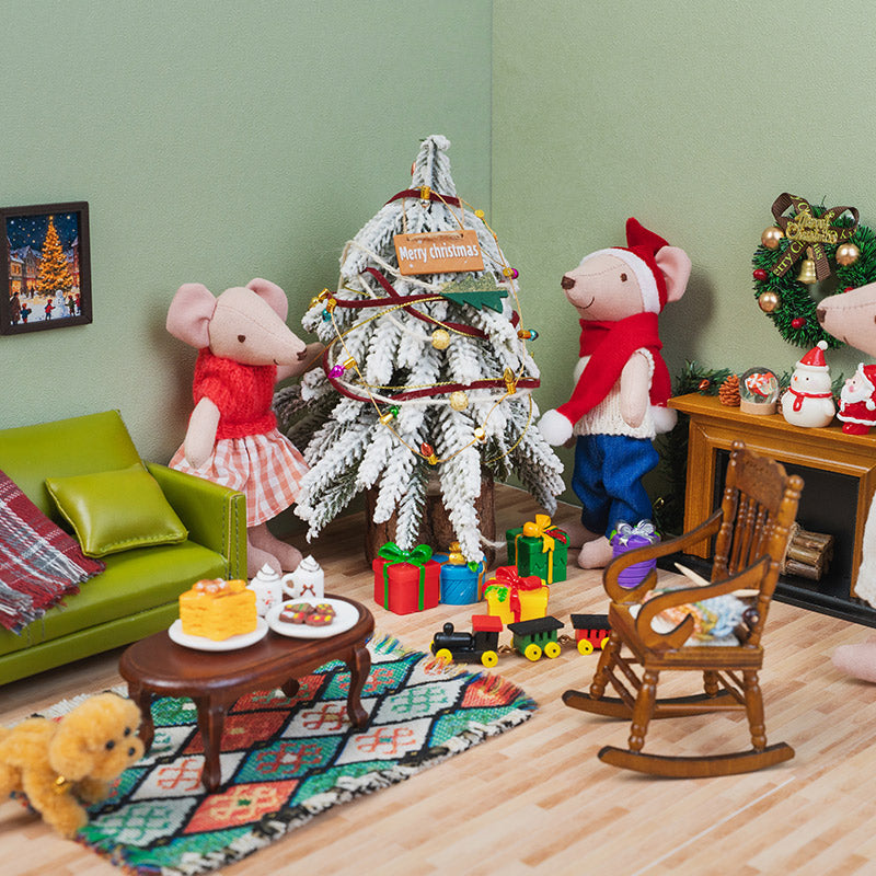 Christmas girl mouse doll decorating a snowy miniature tree with family, surrounded by gifts in a cozy holiday living room.